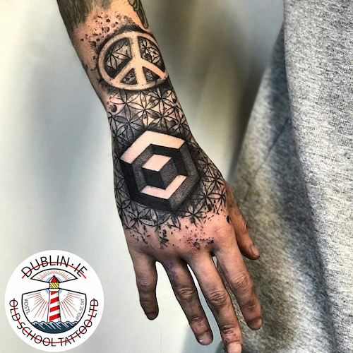 geometrical hand tattoo